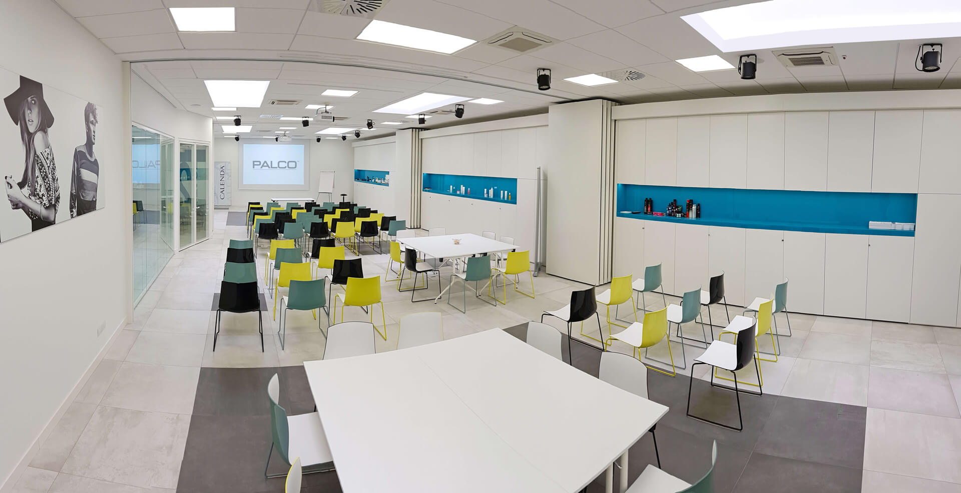 Calenda Hair Academy classroom set up for a training session with 'Palco' branded styling stations.