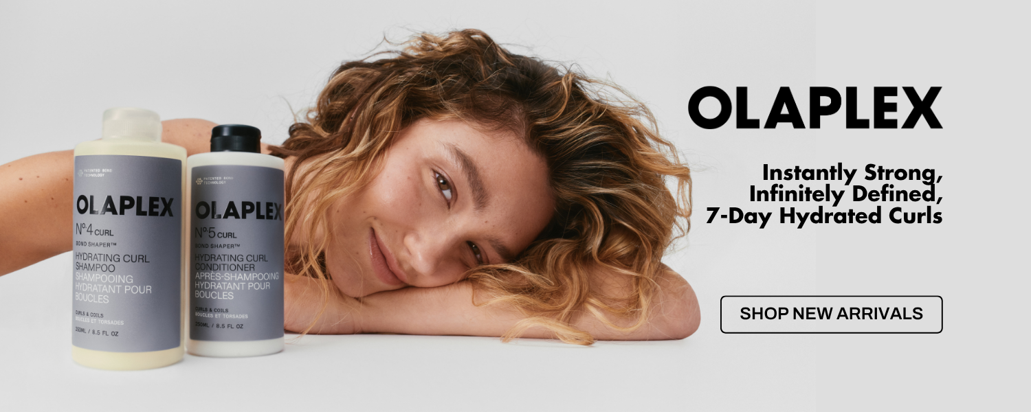 Olaplex No. 4-Curl and No. 5-Curl hydrating shampoo and conditioner with curly-haired model and 'Instantly Strong, Infinitely Defined, 7-Day Hydrated Curls' headline.