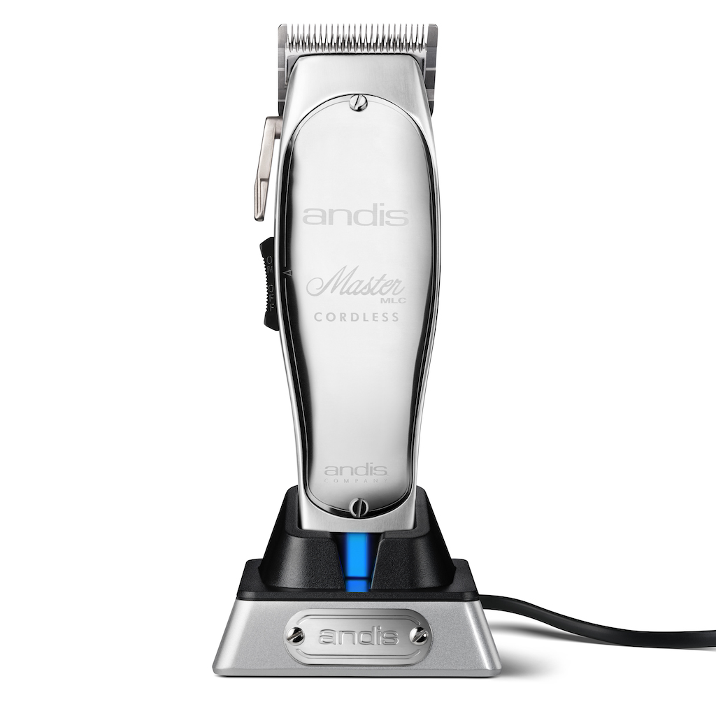 Andis Master Cordless clipper on its charging dock — one of the brands distributed by Morocutti.
